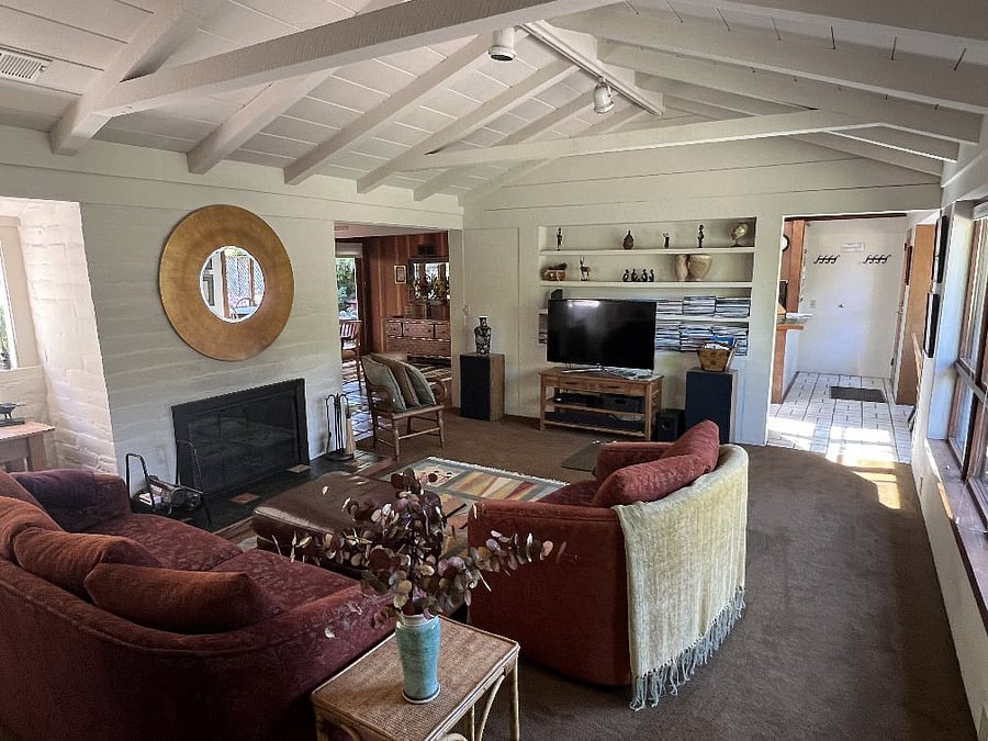 Living room has Cable TV and opens onto dining room.