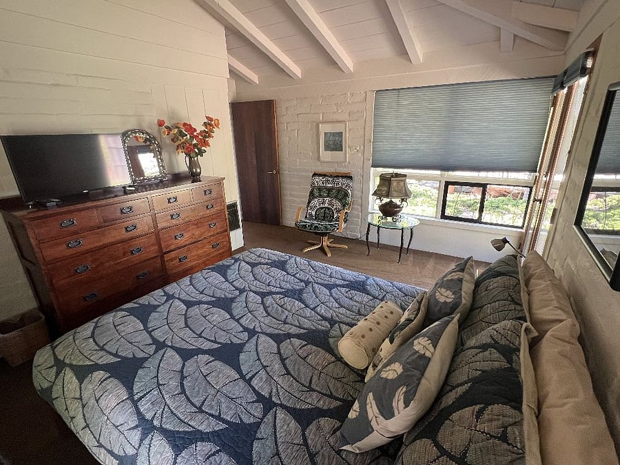Master bedroom has queen bed, large dresser and closet. You can hear the pond waterfall.