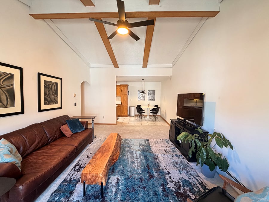 Living room with view toward the dining room.