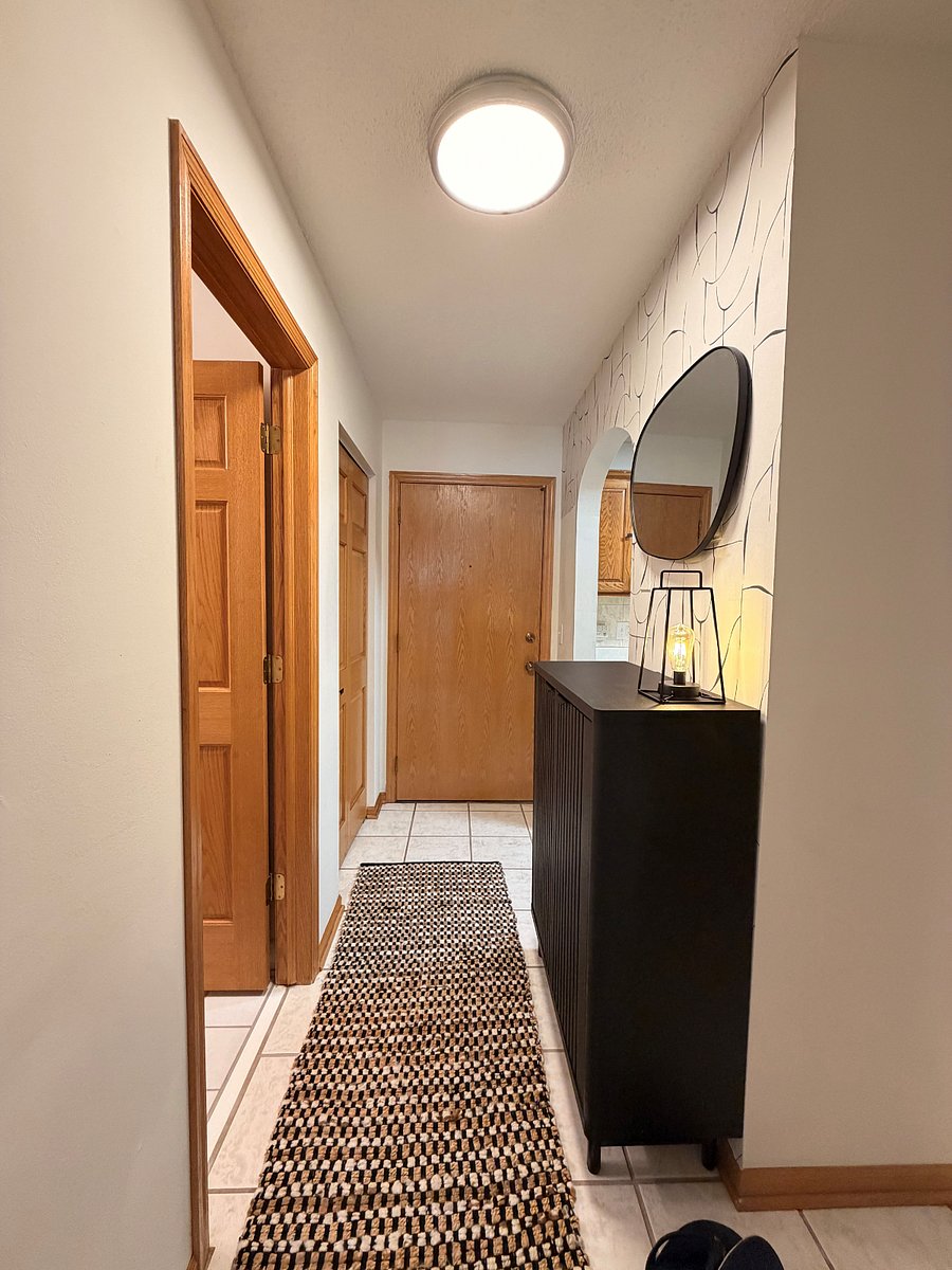 Entry way with shoe rack.