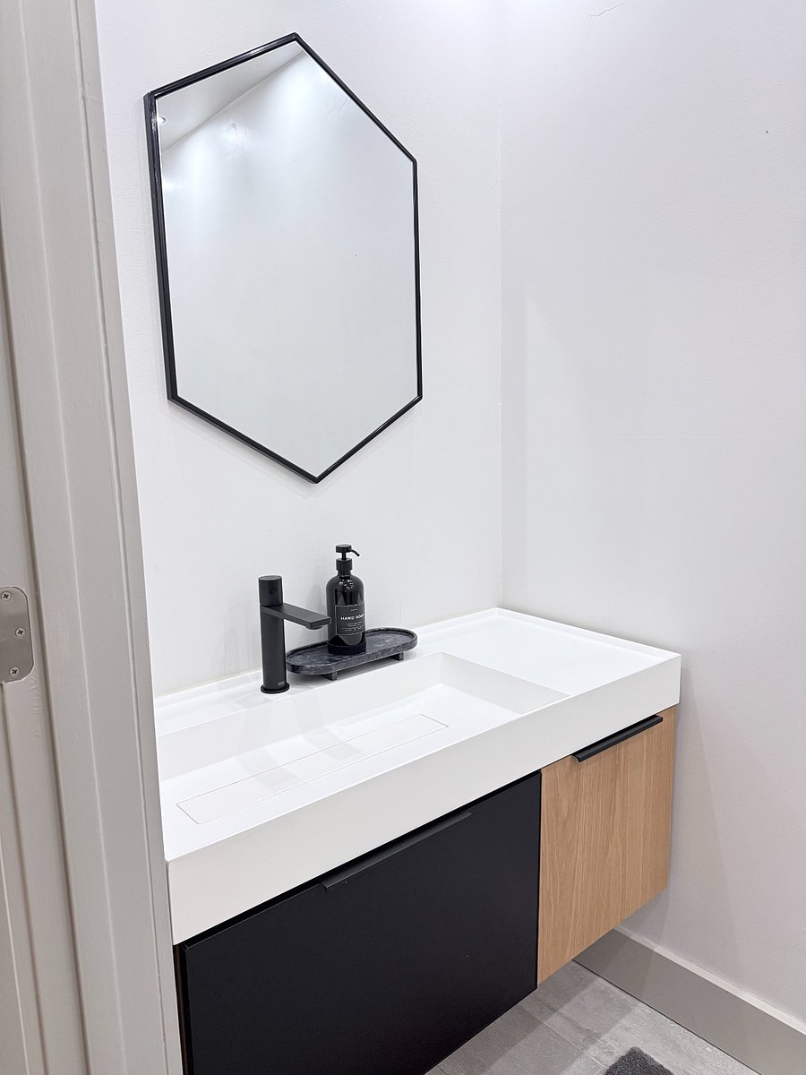 1/2 bath off the living room & office
