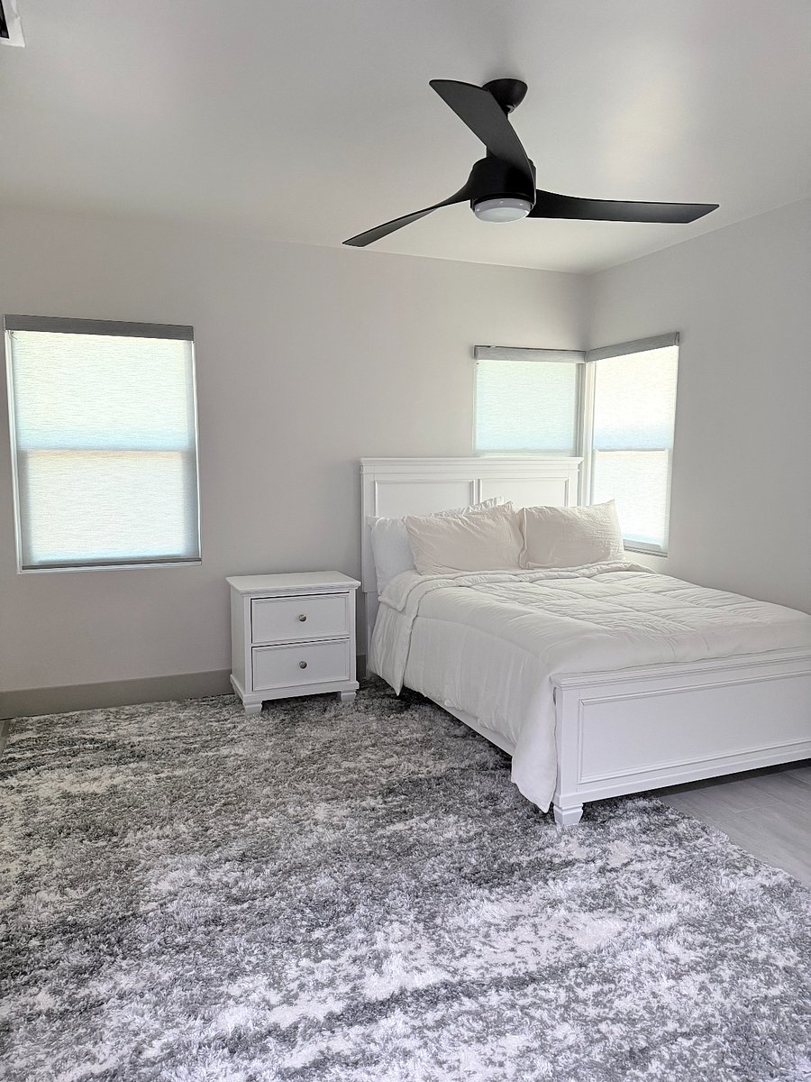Queen bedroom with TV