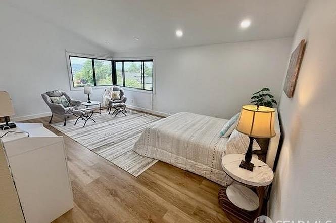 Room 1 Master bedroom with a King size bed.