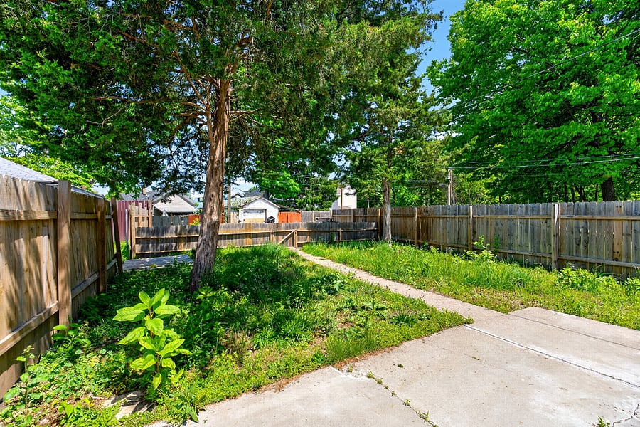 Fenced backyard and on site parking
