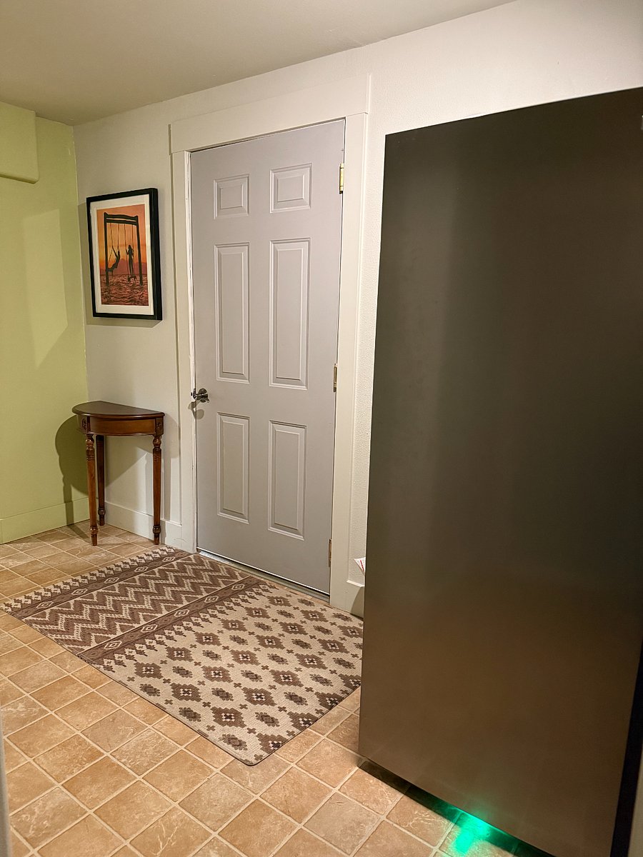 15.5 cubic foot standing freezer by the door to the attached garage provides plenty of storage space for frozen goods.
