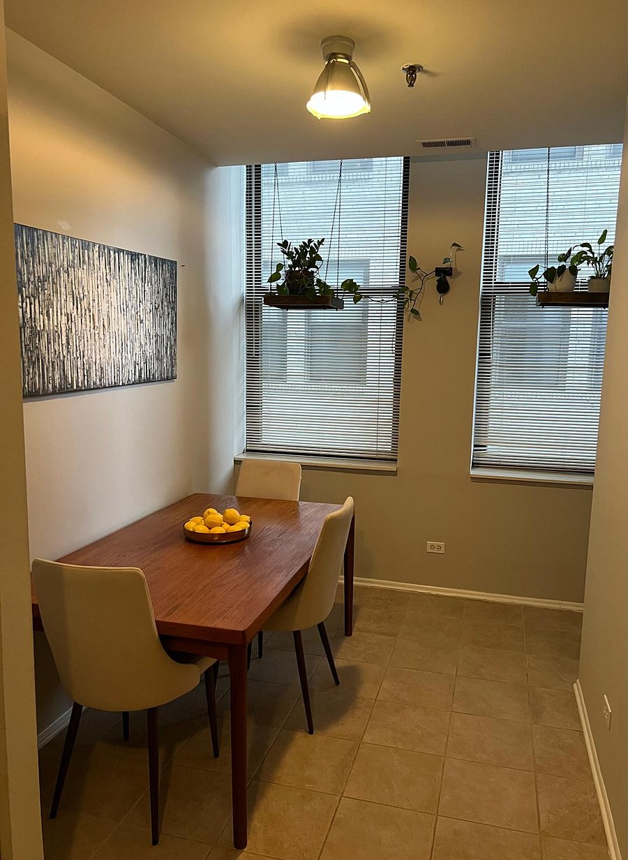 Sun-filled attached dining room.