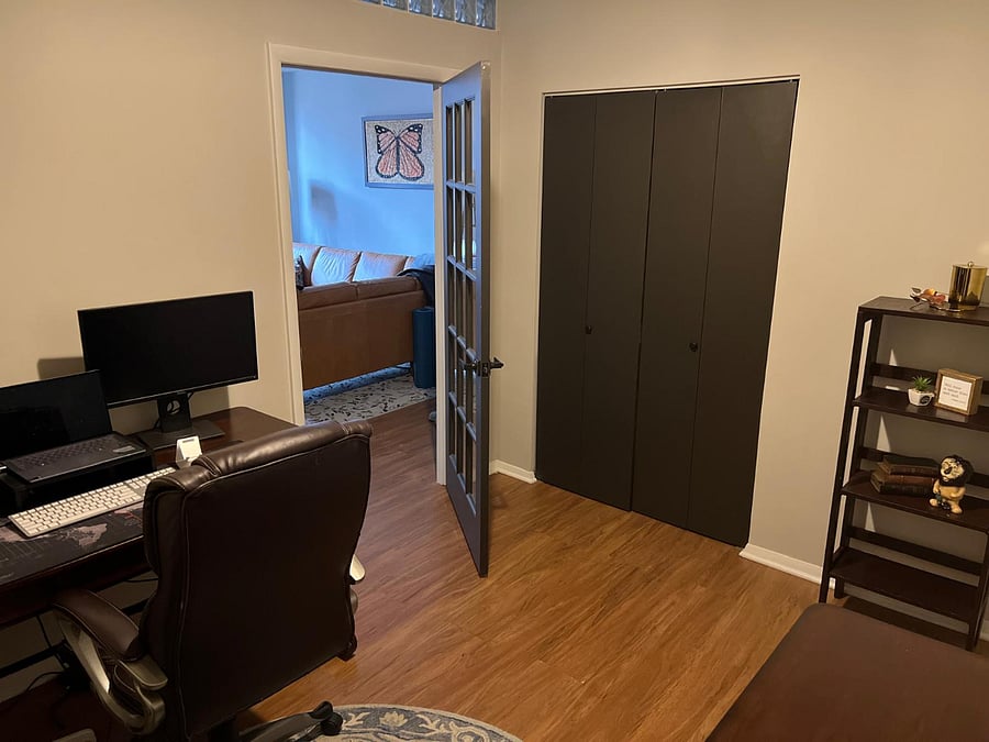 Business office with dual Dell monitors, a docking station, and a connected Epson Workforce Pro.