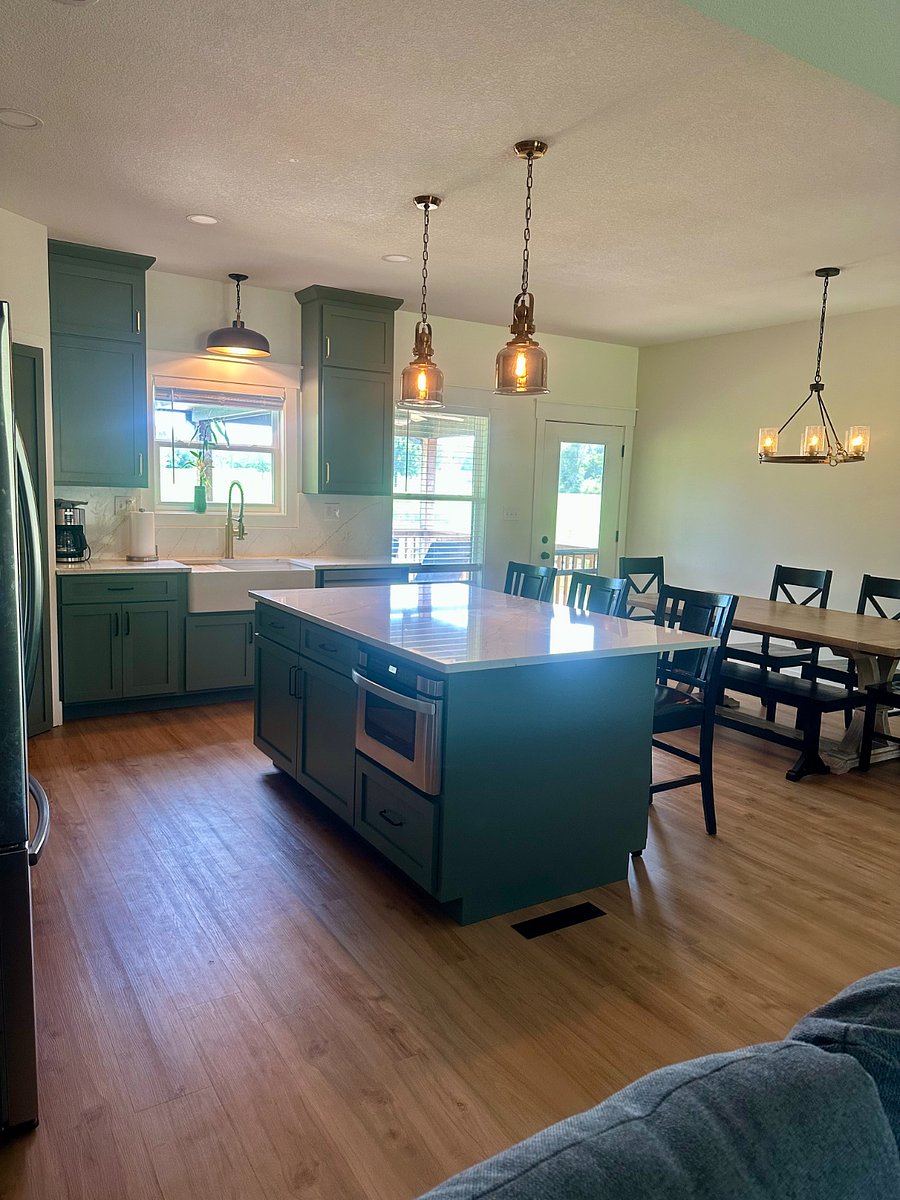 Kitchen Area w/ oversized Granite Island and seating