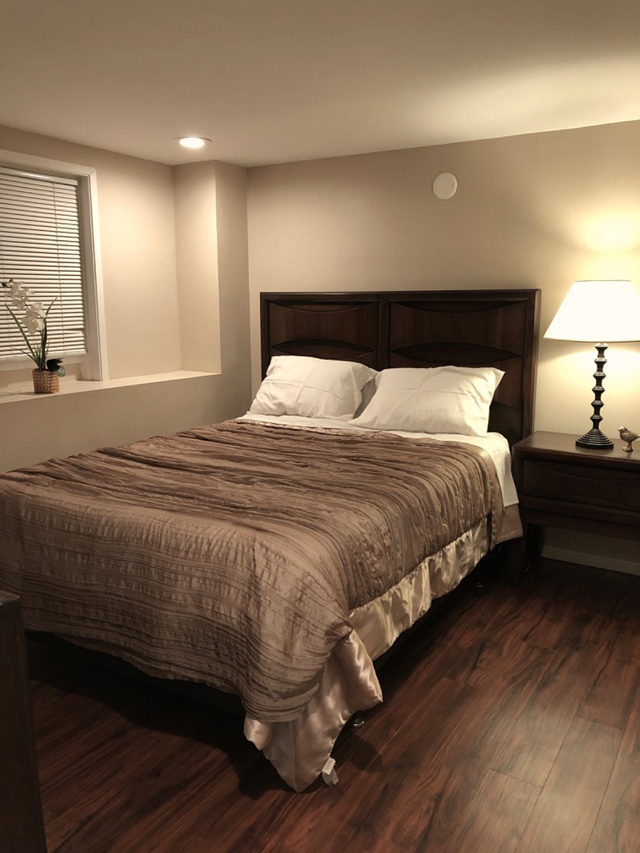 Bedroom 1 - Recent photo. New comforter. Night-time view