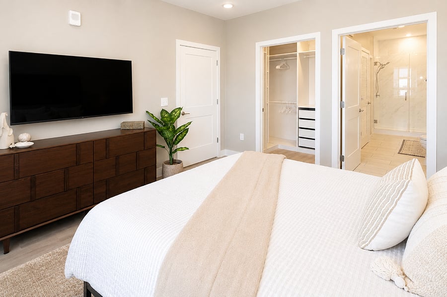 55" smart TV in bdrm
Walk-in closet with custom shelving