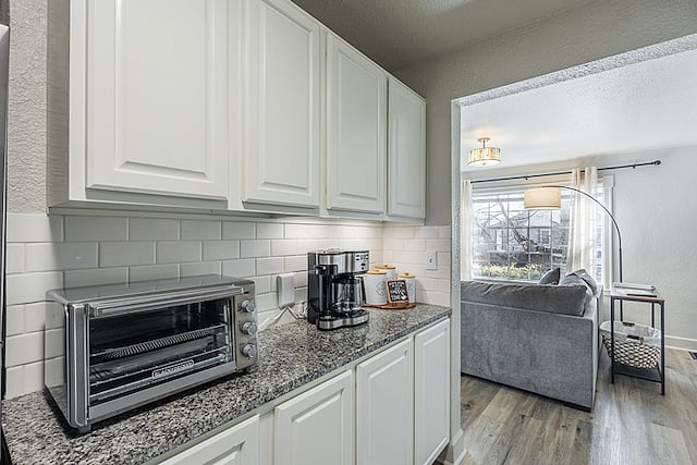 The kitchen is right off the living room.