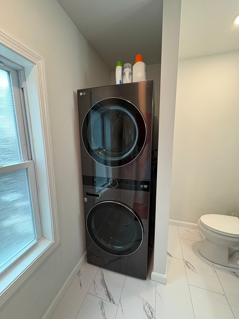 Shared laundry. (Note w/d located in owner's otherwise private bathroom.)