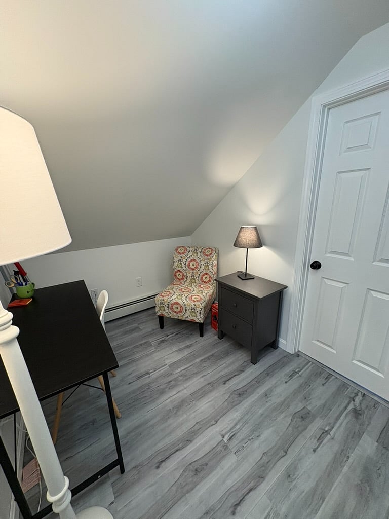 Tenant private nook with reading chair and desk. Second floor.