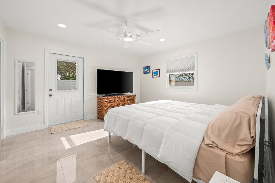 Room 2. Has door access to the backyard.