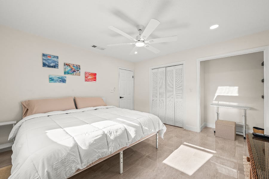 Room 2. Has door access to the backyard.
