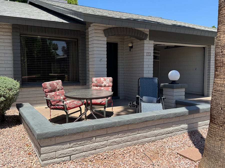 Enjoy morning coffee on the front patio that overlooks a green space. Wifi signal great as well if you need to work. 