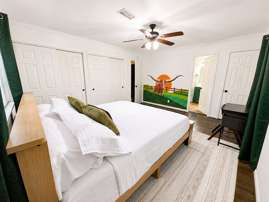 Master bedroom with en suite bathroom and 3 closets