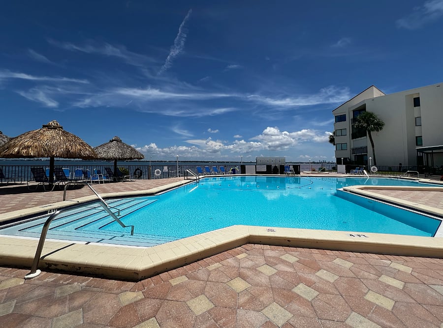 Heated waterfront pool at the complex