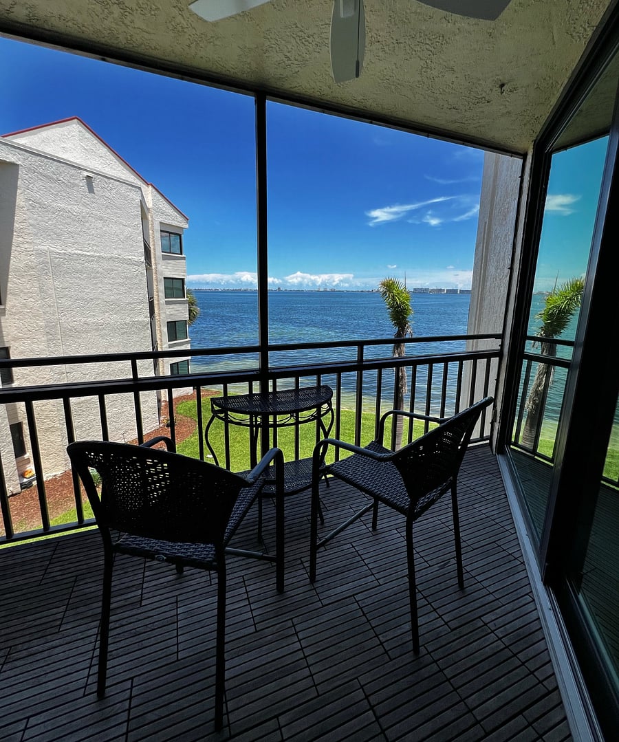 Screened in waterfront balcony