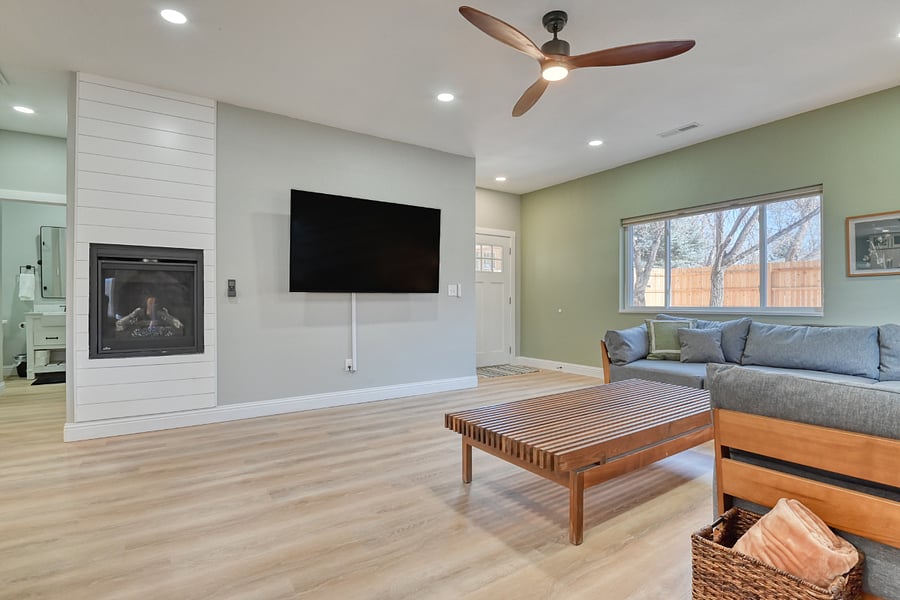 70" Smart TV and fireplace in living room