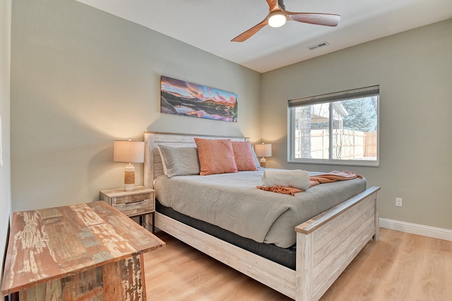 Front Bedroom with King Size bed and a desk workspace