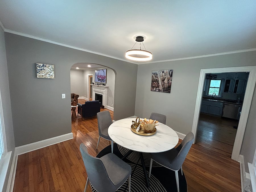 The dedicated dining room offers a bright, welcoming space with plenty of natural light and classic home charm. Whether youre enjoying dinner, working from your laptop, or starting the morning with coffee, it provides a comfortable and flexible area to settle in and feel at home.