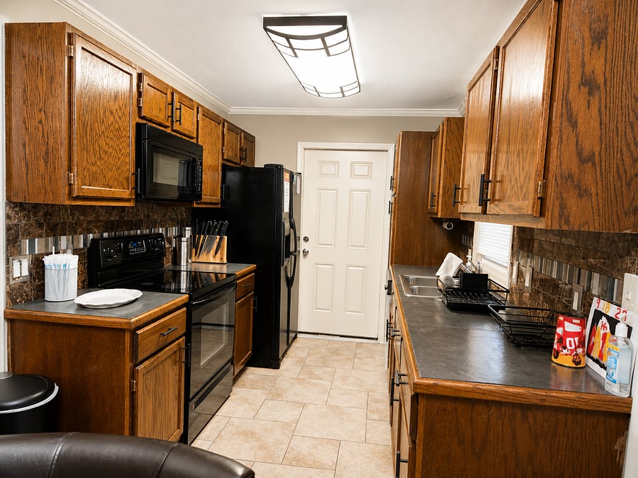 Fully equipped kitchen with dining space for shared meals