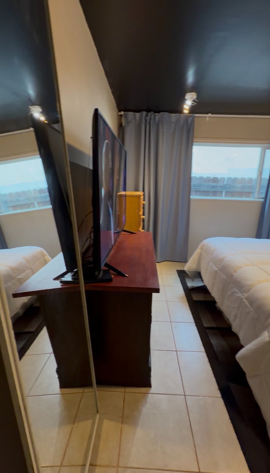 Large TV
Large wall window
Black out curtains