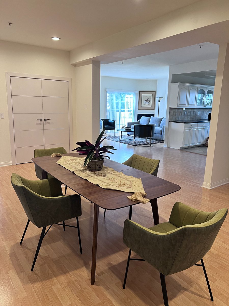 The dining room.  Open floor plan makes kitchen through living room visible.