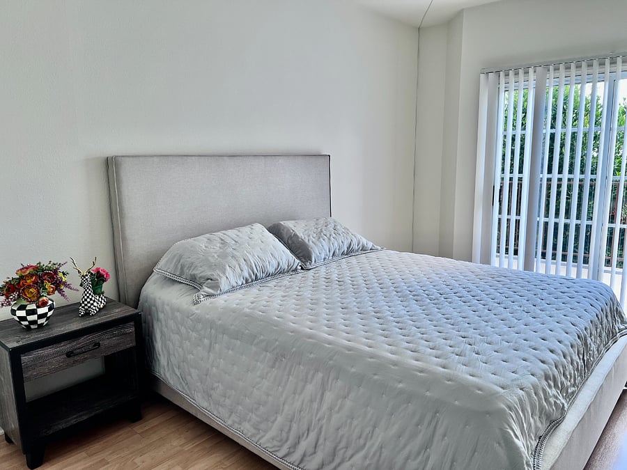 Primary bedroom with outdoor access.