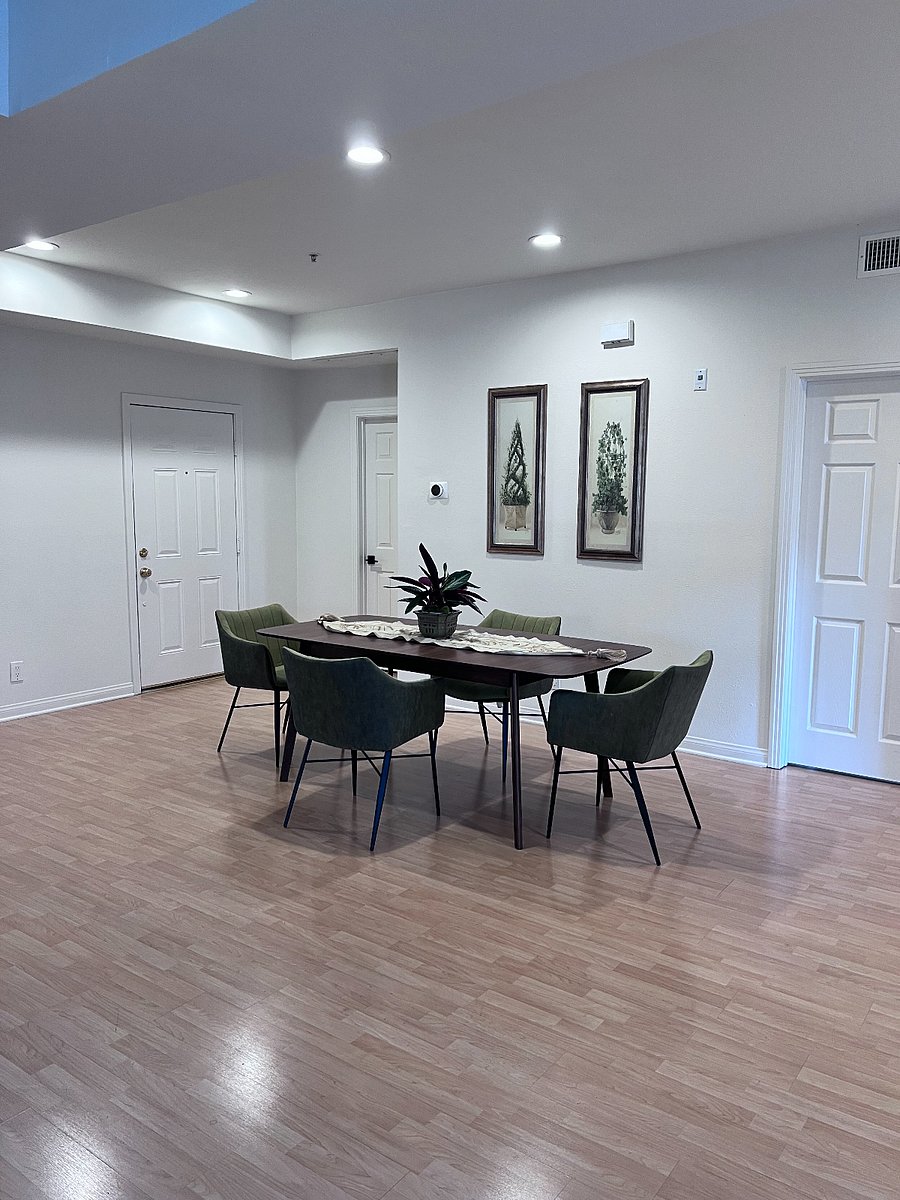 Dining Room with very high ceiling.