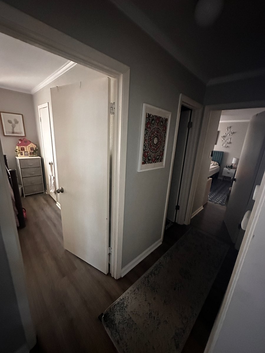 Hallway between bedrooms, bathroom
