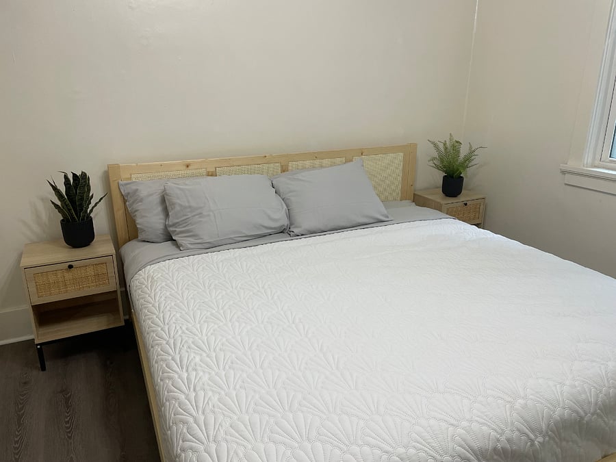 Comfortable master bedroom with king bed