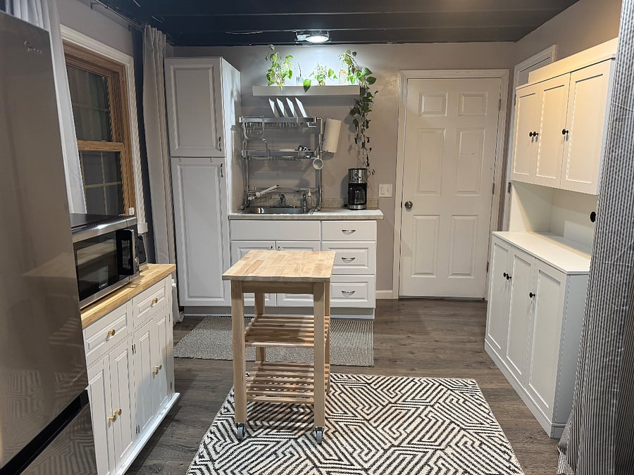 Kitchenette is equipped with an air fryer, microwave, toaster, electric kettle, crock pot, sink, refrigerator, hot plate, and laundry!