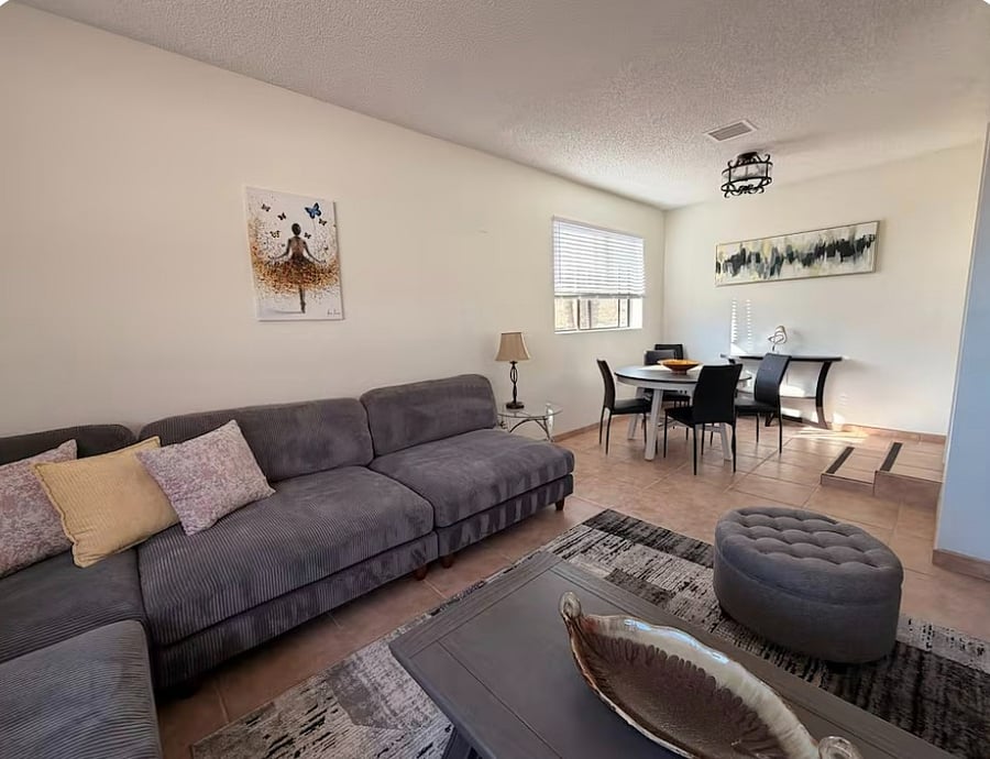 Living Room #1 with TV and dedicated workspace/dining table