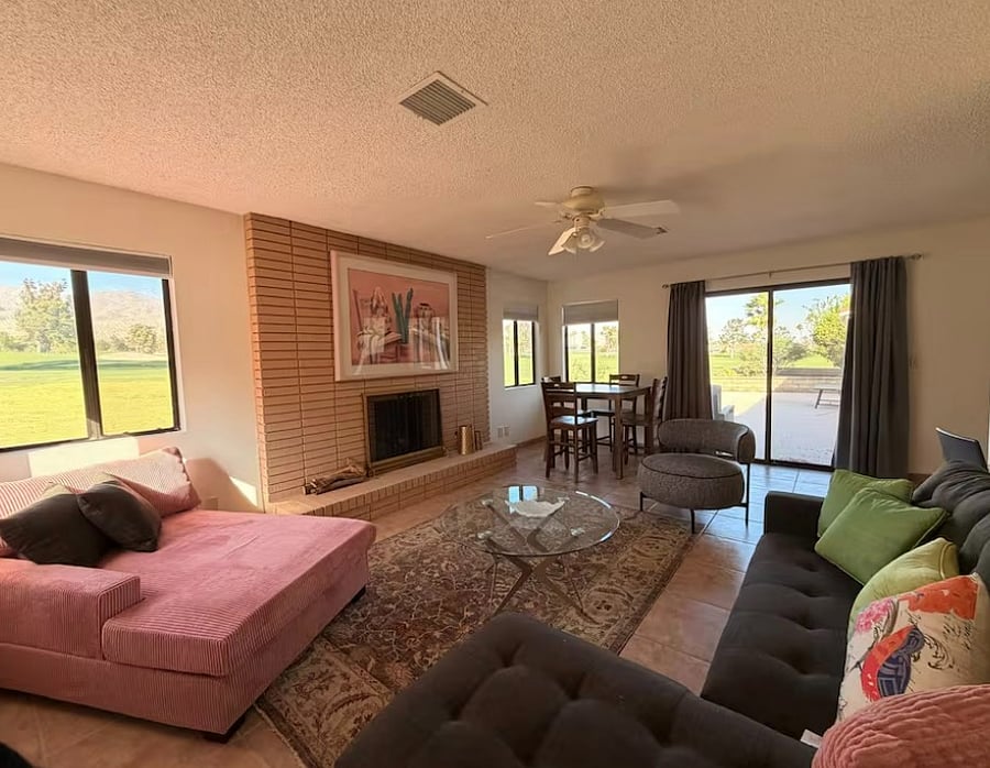 Living Room #2 with fireplace and golf course views