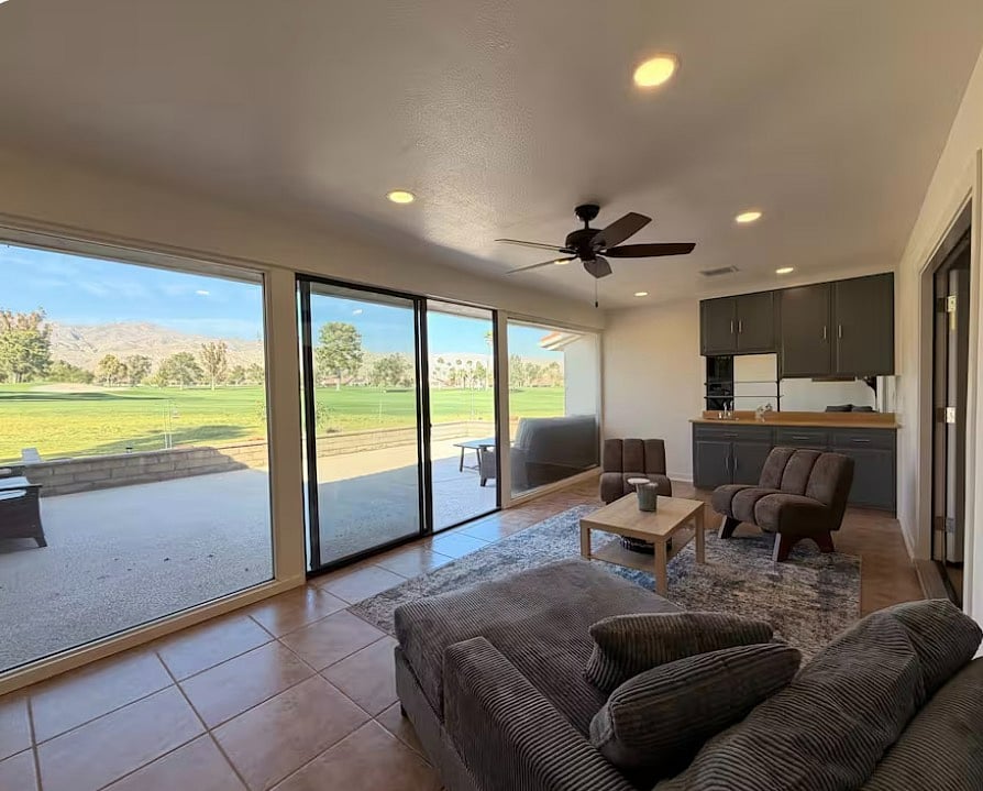 Living Room #3 with wet bar and patio/golf course views