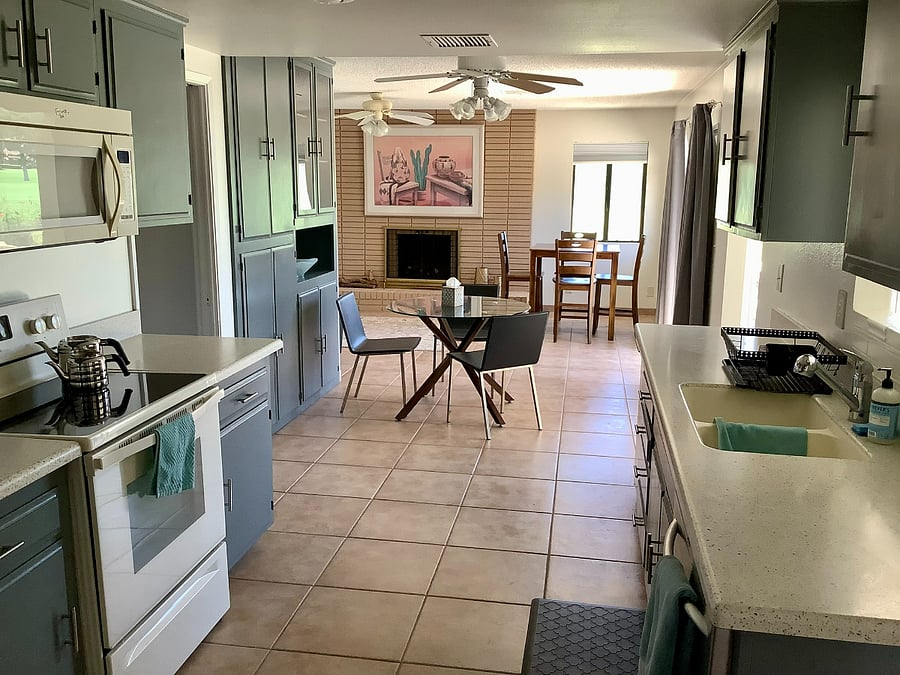 Full kitchen with dining tables