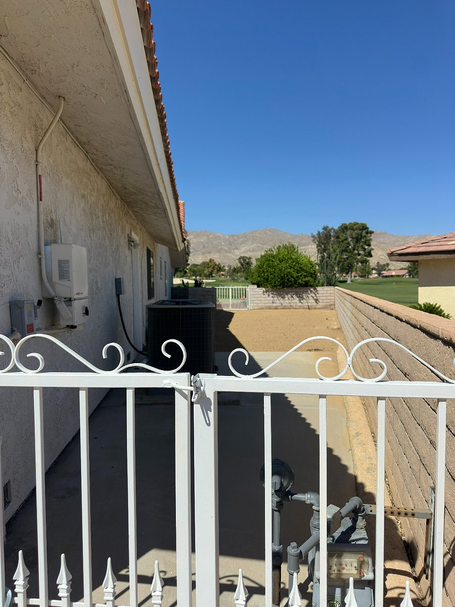 Gated side yard for pet run area