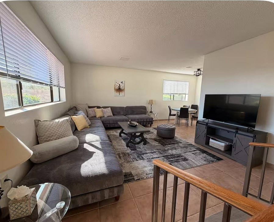 Living Room #1 with TV and dedicated workspace/dining table
