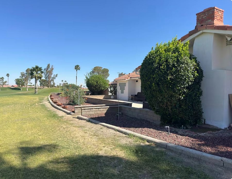 View of back of home and patio