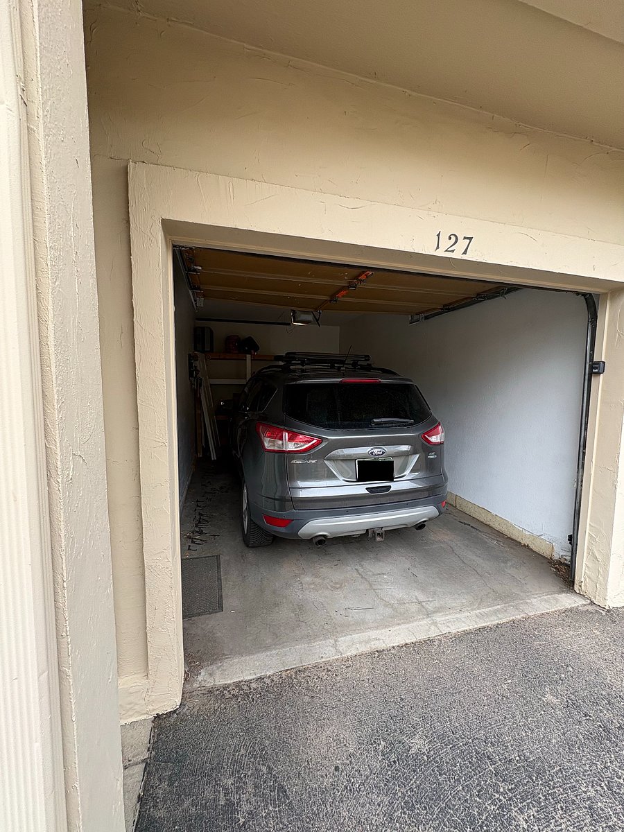 One car garage and storage (our midsize SUV parked to show you how much room!)