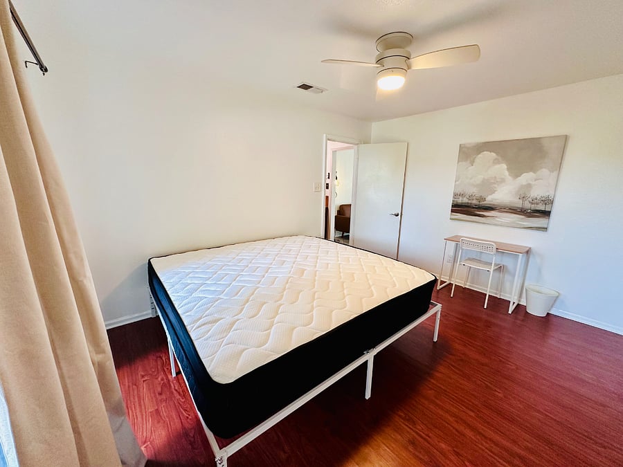 King bed and workspace