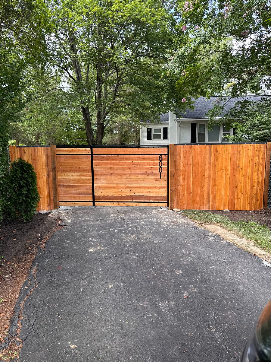 Gated entrance of pipe-stem driveway 