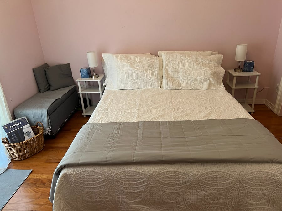 Comfy queen memory foam mattress with crisp linens.