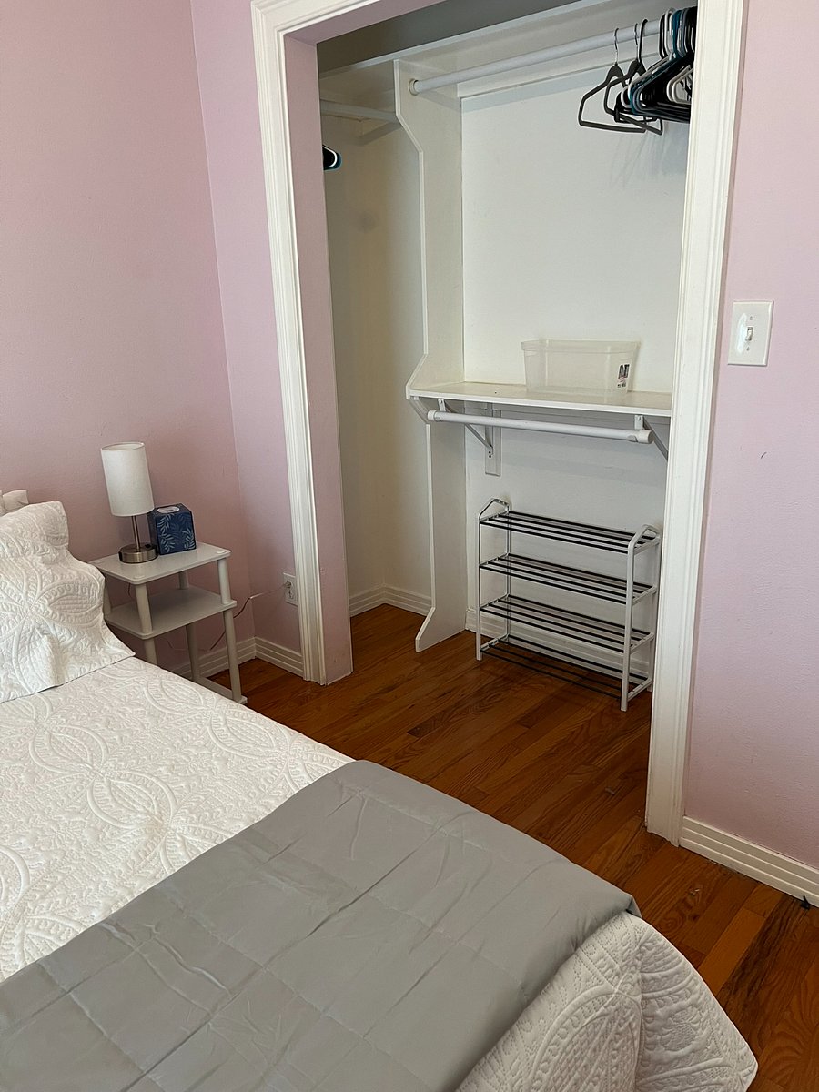 Spacious closet with plenty of storage.
