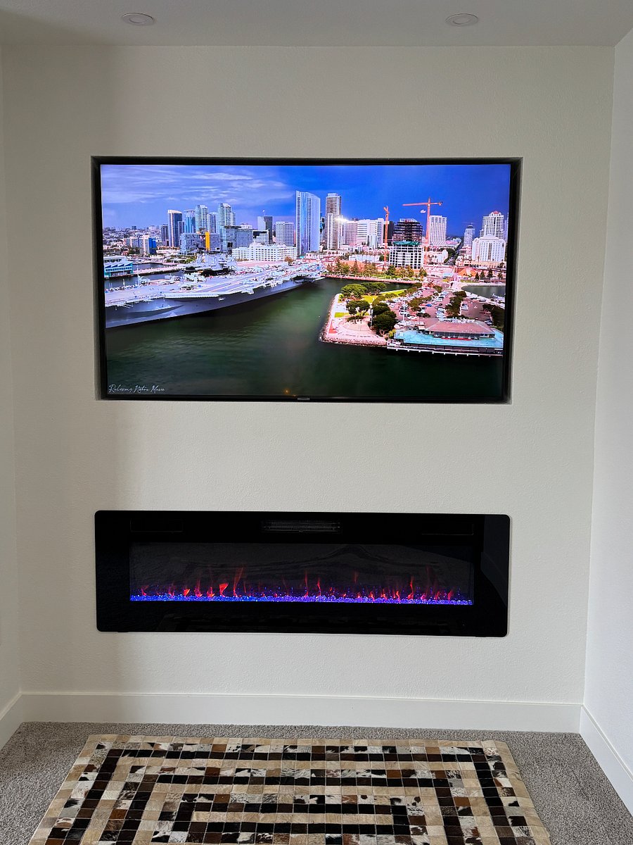 Master Bedroom 65" TV with built-in fireplace