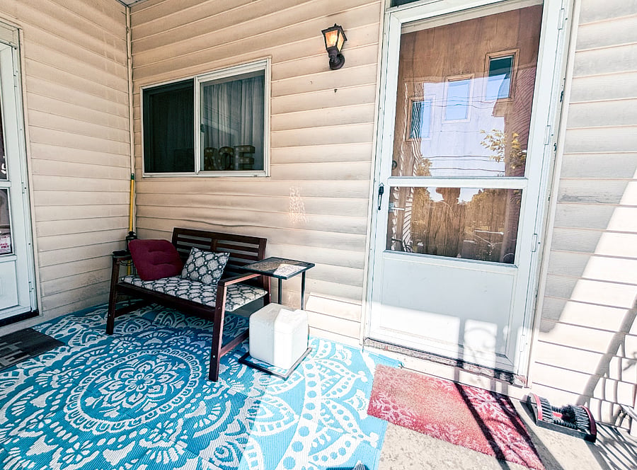 Entrance, door with patio door. The area to the left will be enclosed-future bathroom.