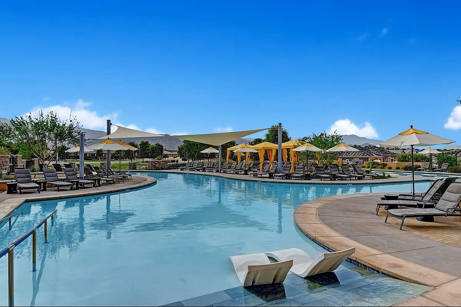 Trilogy resort pool area - two pools, jacuzzi, lots of lounge chairs and shady spots for relaxing