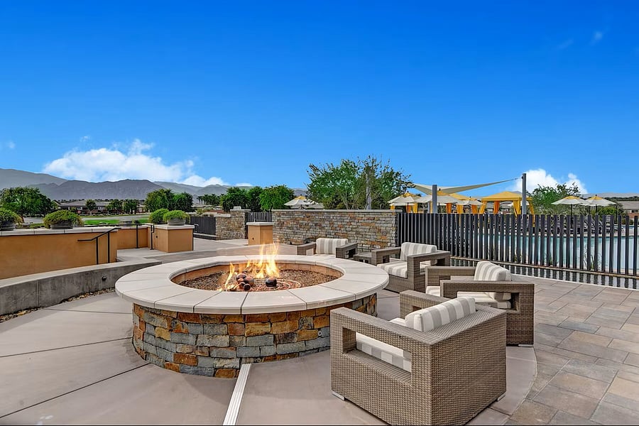 Trilogy firepit area on Polo Club's back deck overlooking lake